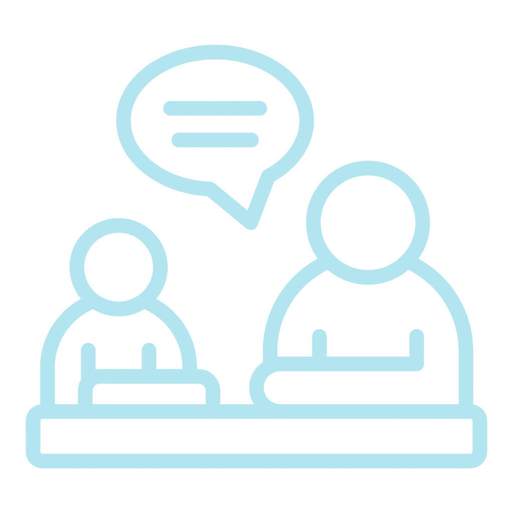 Blue line drawing of two people sitting at a table, one with a speech bubble above their head