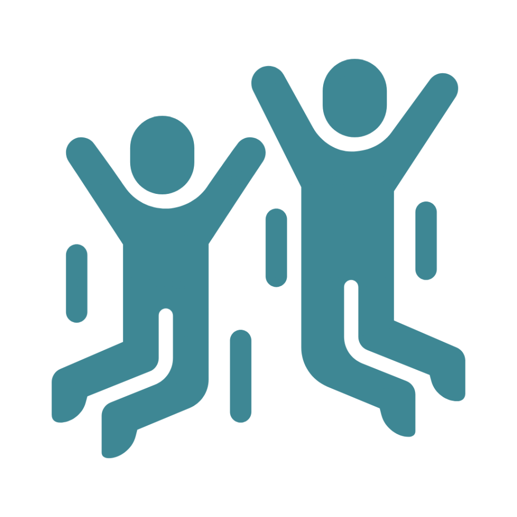 Two people with their arms raised, jumping for joy.