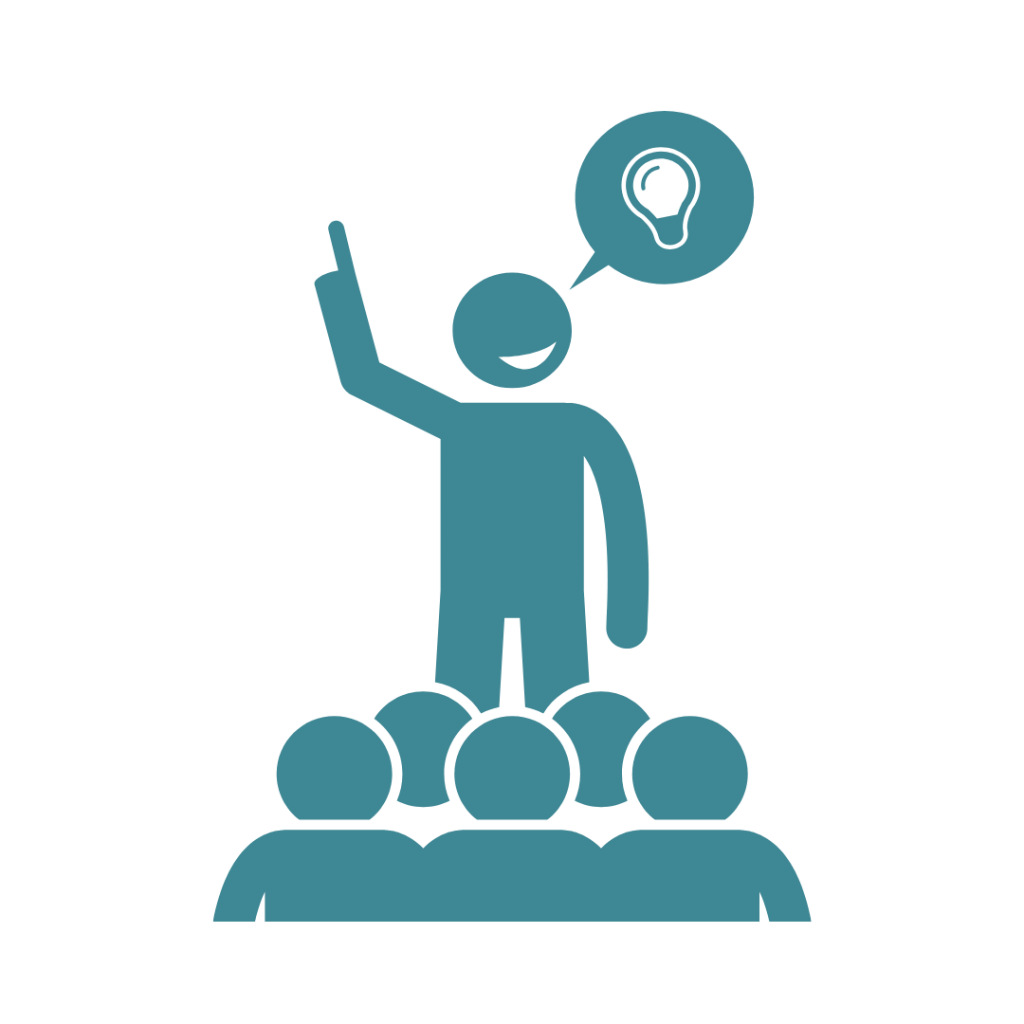 A stick figure standing on a platform, addressing a group of people. A speech bubble with a lightbulb icon is above their head.