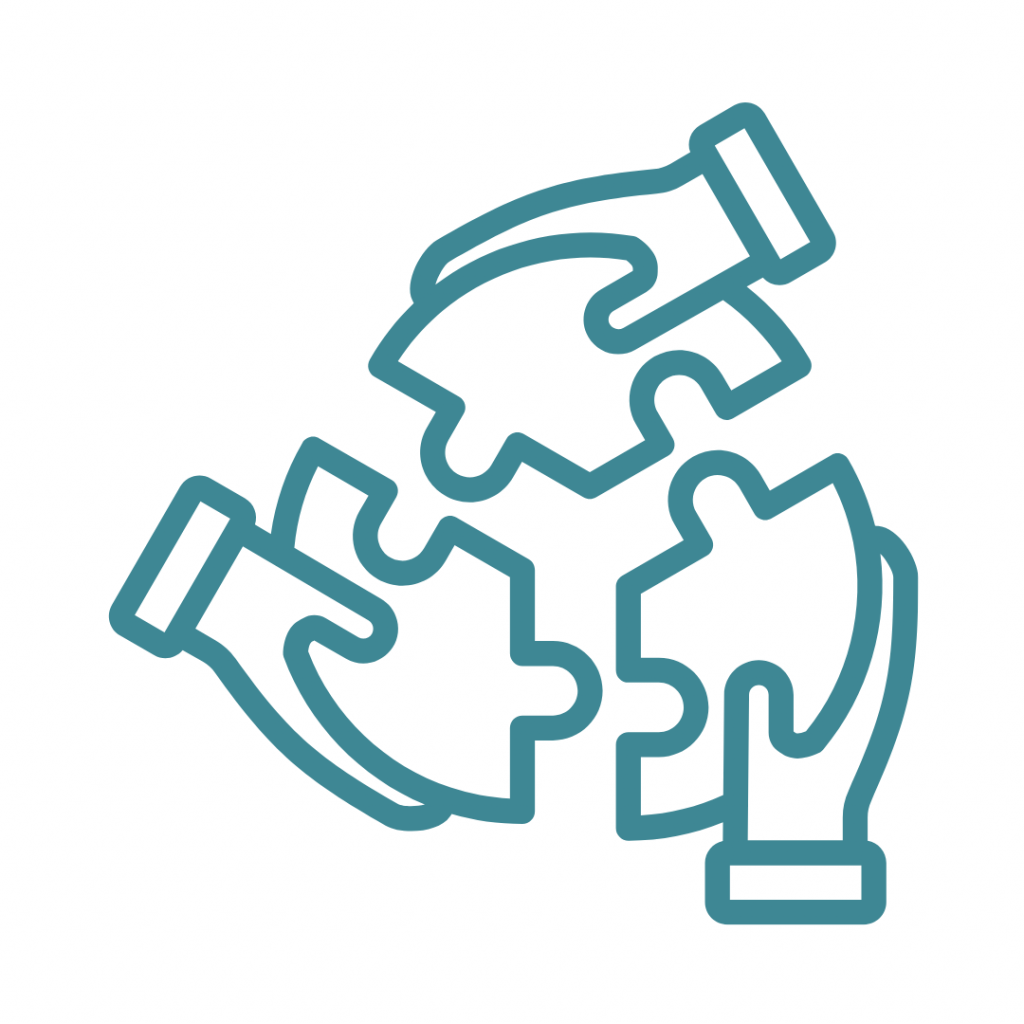 Image of hands putting together puzzle pieces.