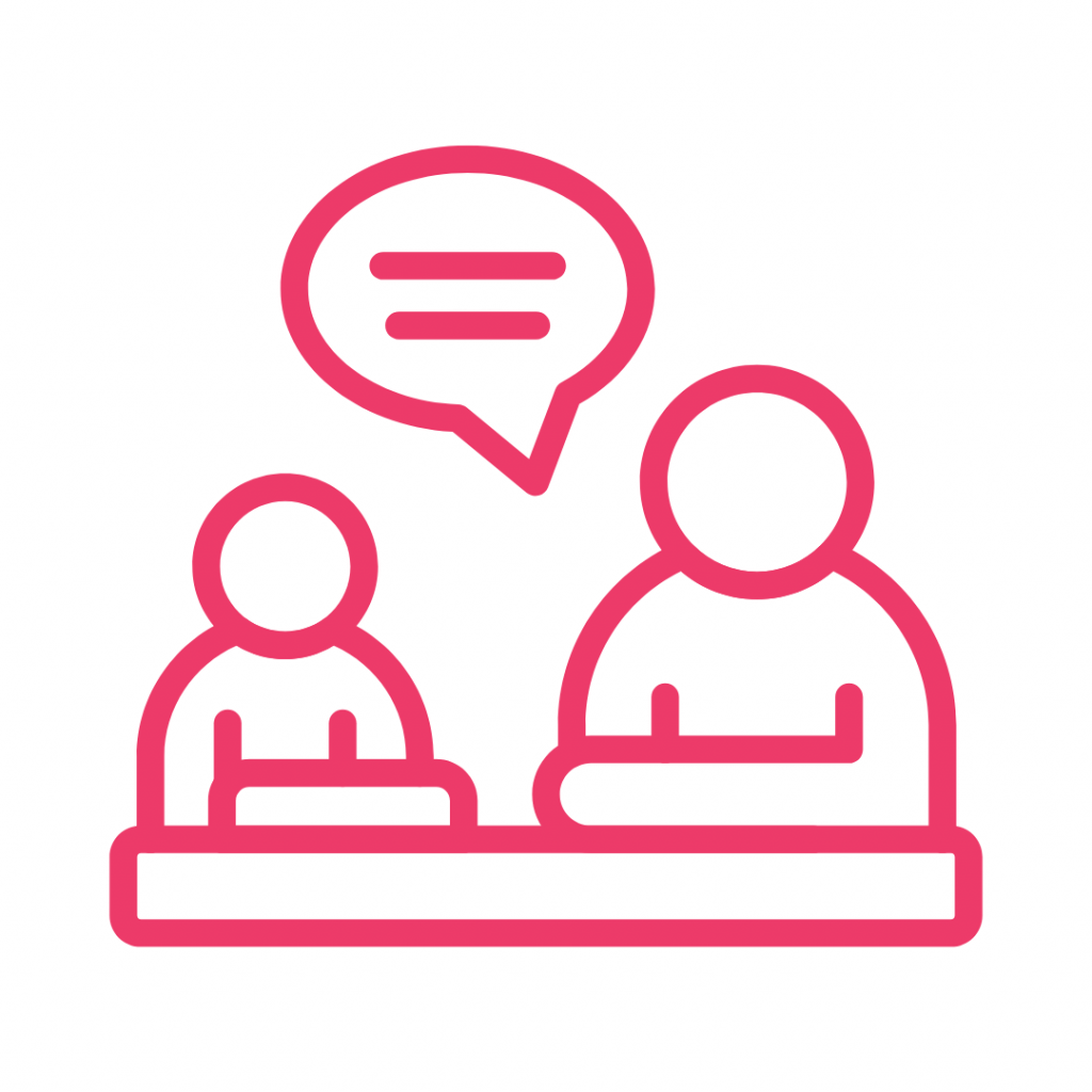 Line drawing of two people sitting at a table, having a conversation.