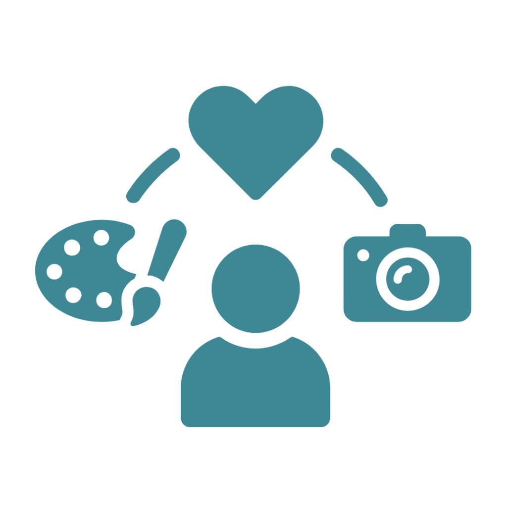 A teal icon shows a stylized person at the bottom, with a heart above their head connected by two curved lines to a painter's palette and paintbrush on the left and a camera on the right, suggesting love or passion for creative pursuits.