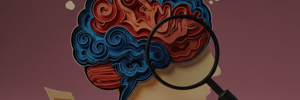 A paper-cut style image of a human head in profile, showing a colorful, layered brain structure (reds and blues), with a magnifying glass held up to the right side of the brain. The background is a solid maroon color.